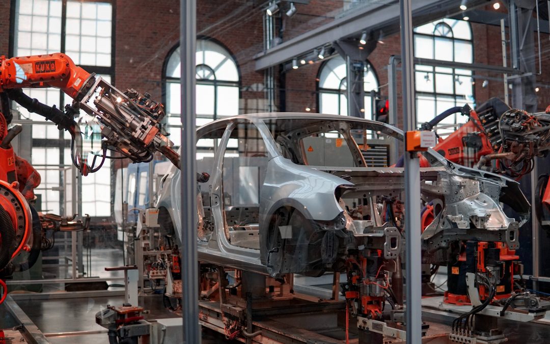 Car in a manufacturing plant being assembled